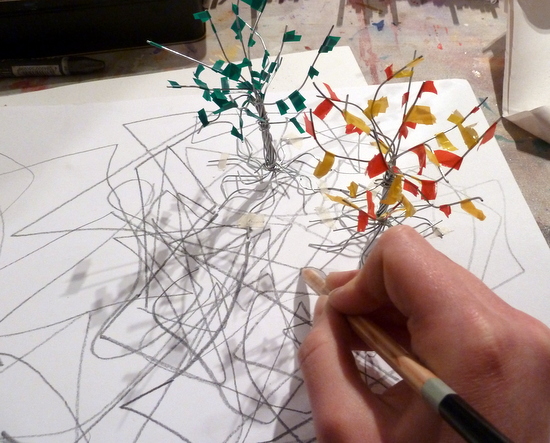 Drawing feeding making - tree growing from the paper