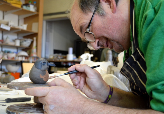 Mark paints his dotterel bird- Rowan