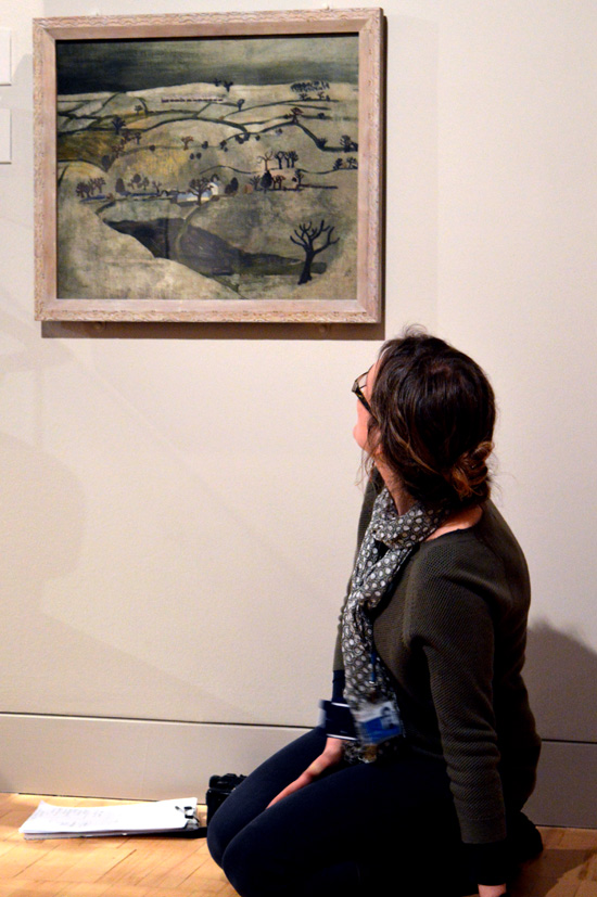 Kate looking at Ben Nicholson and guides teachers into the painting