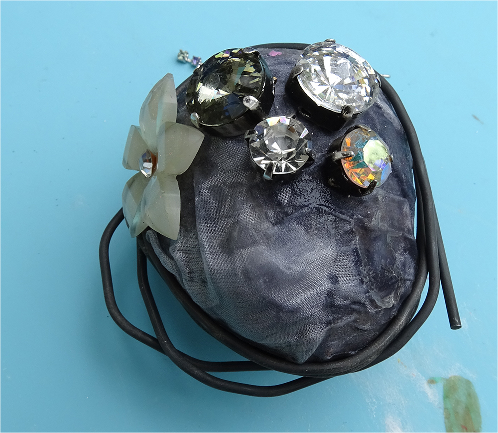 Gemstone caught in wire