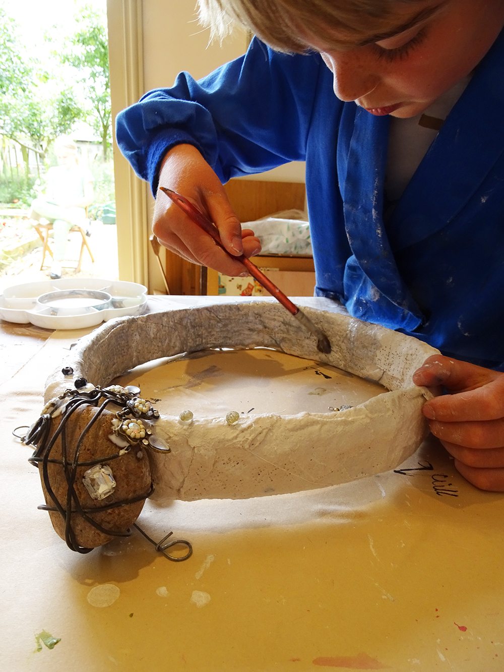 The bands were then painted or covered in fabric