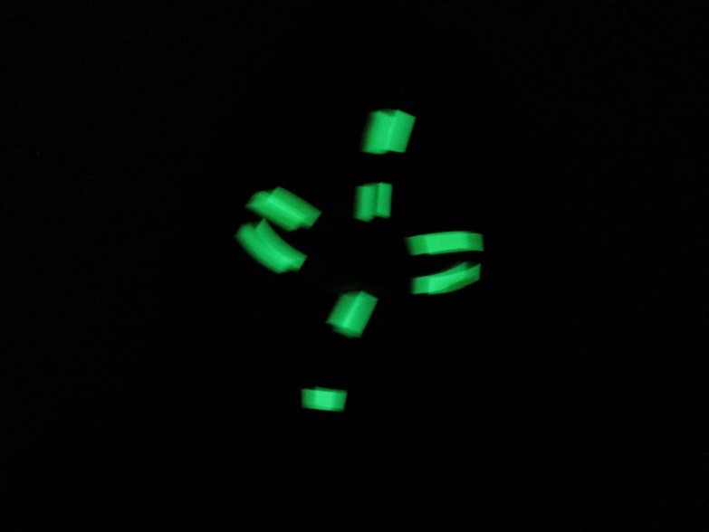 Glow in the dark taped face -Sara Dudman