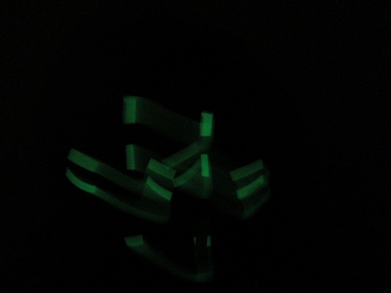 Glow in the dark taped face -Sara Dudman
