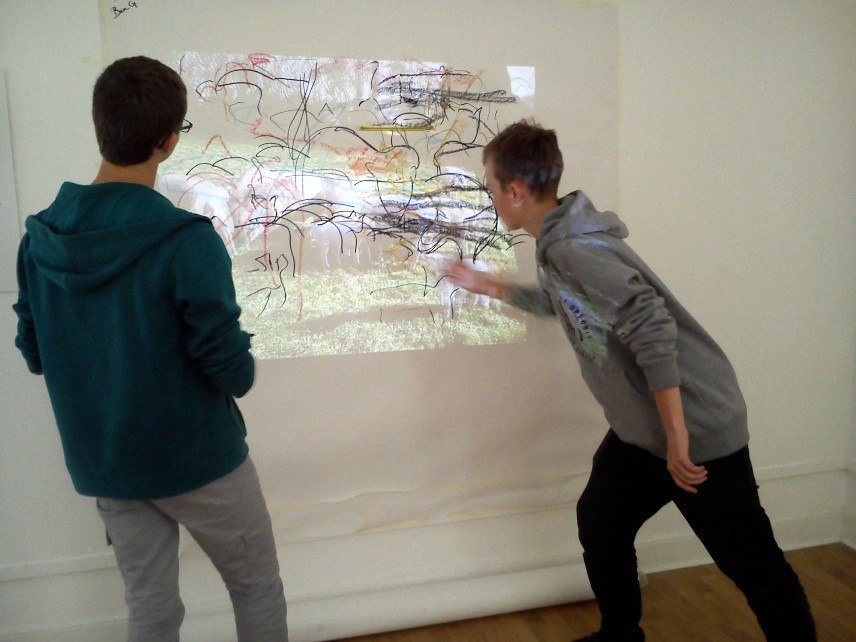 Large scale collaborative drawing activity embeds arm movments in preparation for recreating marks in the dark Sara Dudman