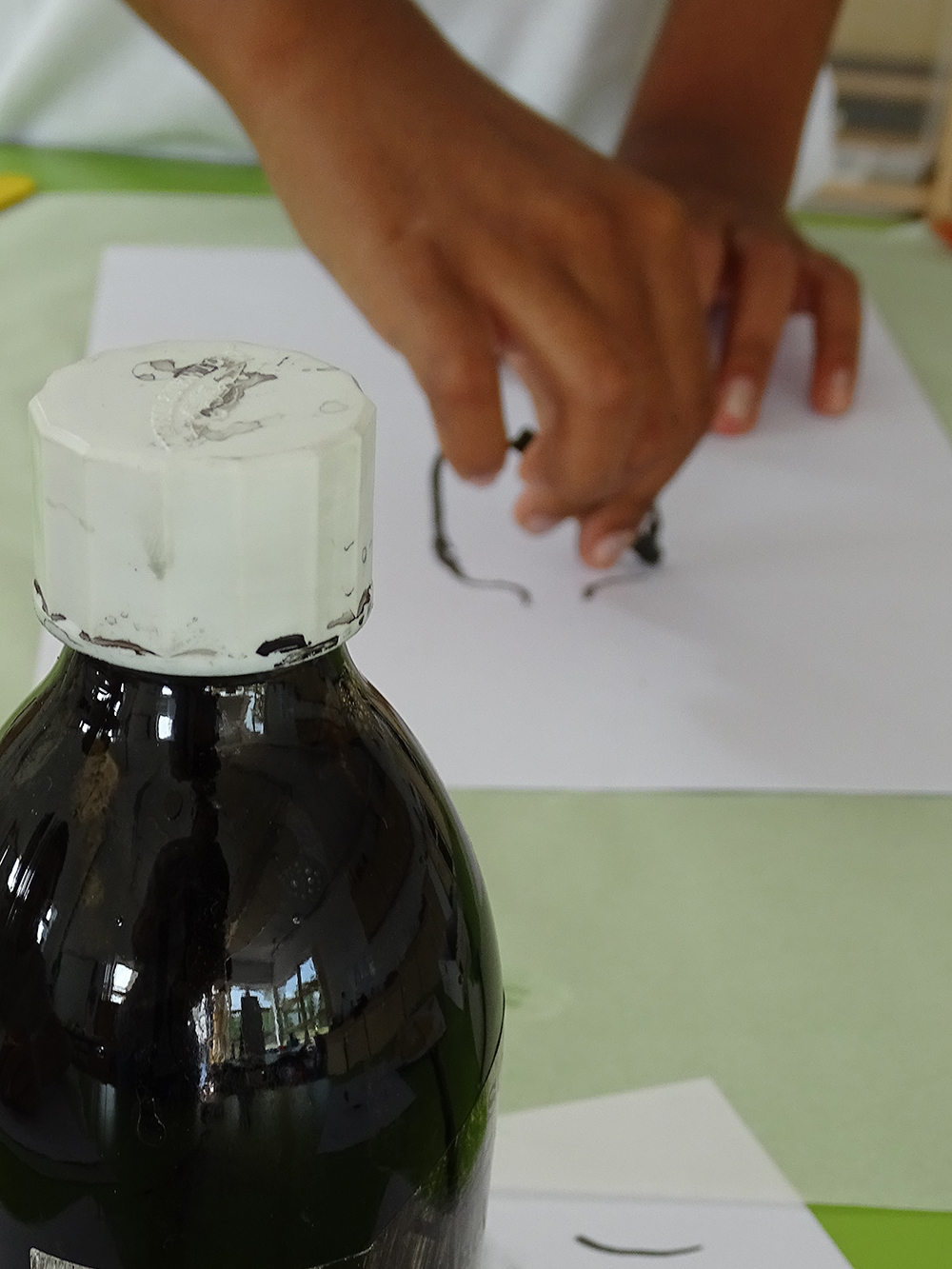 Drawing ink bottle with charcoal