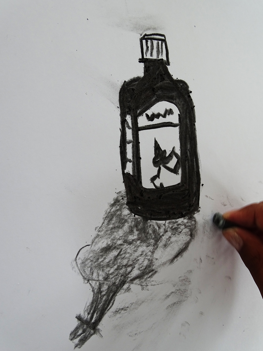 Drawing ink bottle with charcoal