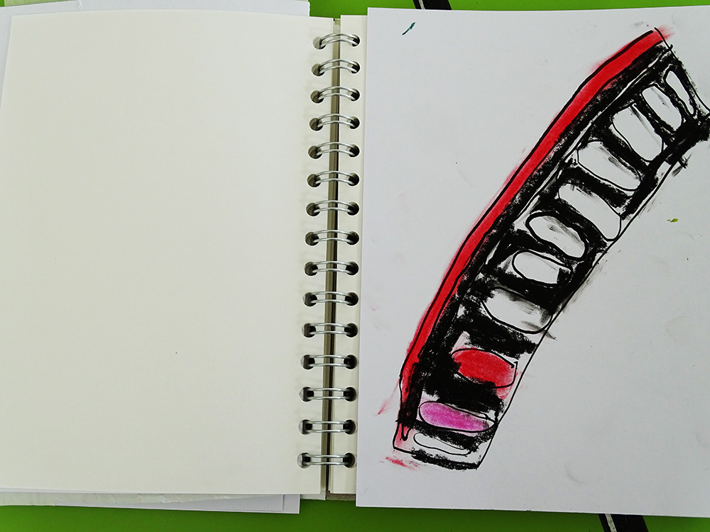 Using ink and quill to draw a paint palette, with pastel colour
