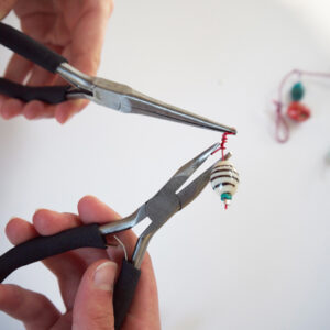 Using two pliers