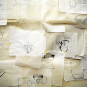 All the drawings taped to the wall to make one large still life