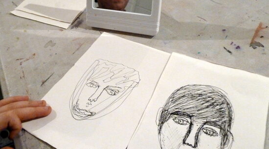 Repeat drawing yourself again - this time try not to look in the mirror
