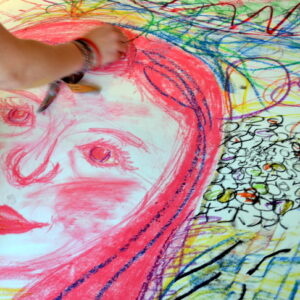 Create large scale drawings of classmates using pastels