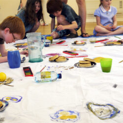 Explore what it's like to draw on fabric and make a communal drawing.