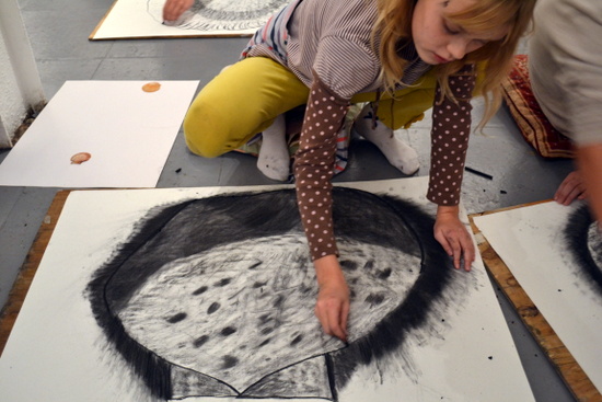 Kitty builds up her drawing of a shell Kitty builds up her drawing of a shell