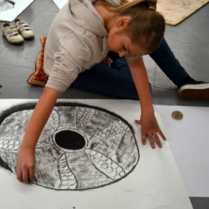 Drawing large scale sea shells with charcoal