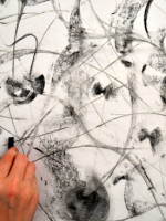 Kitty works in charcoal with invented forms and spontaneous mark making