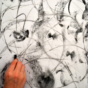 Kitty works in charcoal with invented forms and spontaneous mark making