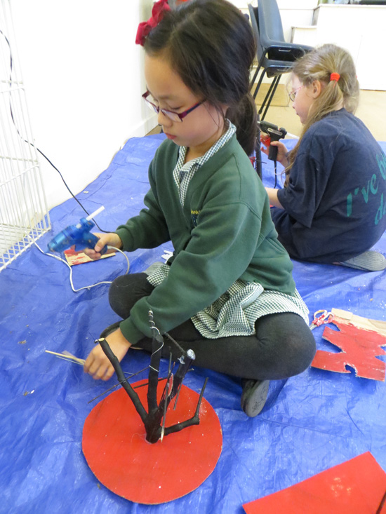 Using glue guns to construct and take risks with balance and composition