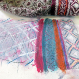 Explore using pastels, with graphite, to capture the texture of fabric