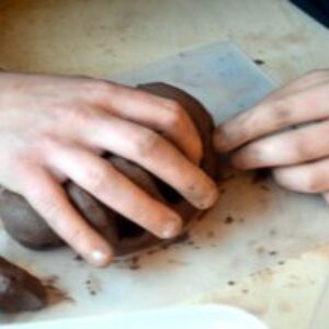 The process of casting and creating negative shapes in plaster from clay positives.