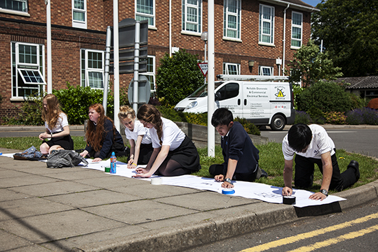 Students at Chesterton Community College being led on drawing exercises by Anne to make them look and respond to the fabric of their school