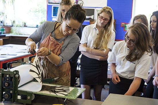 Hannah Webb works with students at Witchford Village College, Witchford