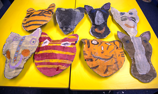 Textile and graphic artist Sharon Gale shows students in the Art Cabin at Northaw CE Primary School in Hertfordshire, how to make Newspaper Animal Heads.