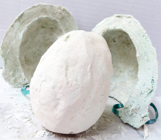 The final plaster egg and its mould