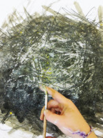 Flicking paint over graphite, wax resist and watercolour nest