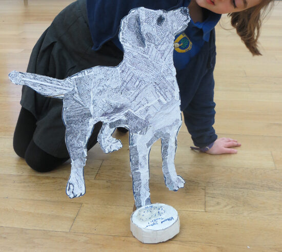 "Flat yet sculptural" standing dog!