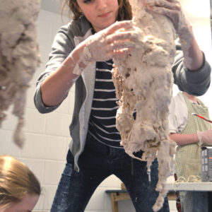 Students work frantically while the plaster goes off