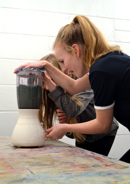 Using an old electric blender to make paper pulp