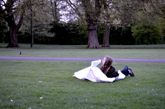 A student from AccessArt's Experimental Drawing Class wrestles with the wind to draw