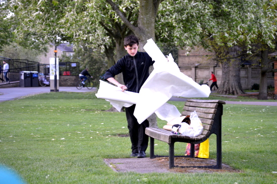 Ingo wrestles with the wind and paper