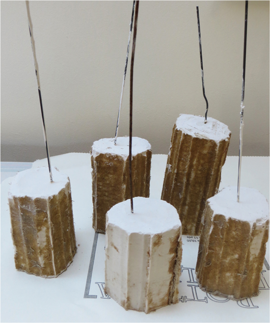 Once the plaster was set the cardboard was removed. The corrugations gave the plinths an architectural feel