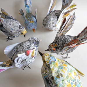 Using old books to create bird sculptures