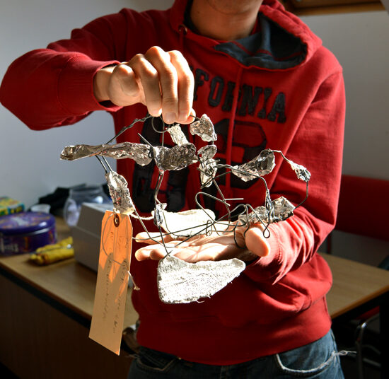 Luke, learner at Red2Green delighted with his finished sculpture in the Arts Council funded Aspire to Create project
