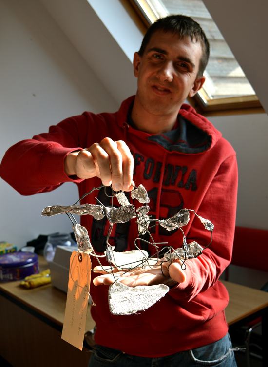 Luke, learner at Red2Green delighted with his finished sculpture in the Arts Council funded Aspire to Create project