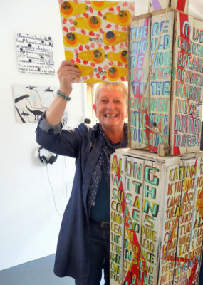 susan with bob sculpture