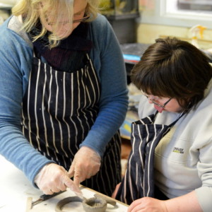 Abi helps Emma build her bird