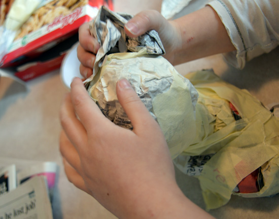 Using newspaper and masking tape to make the BFG's ear and torso
