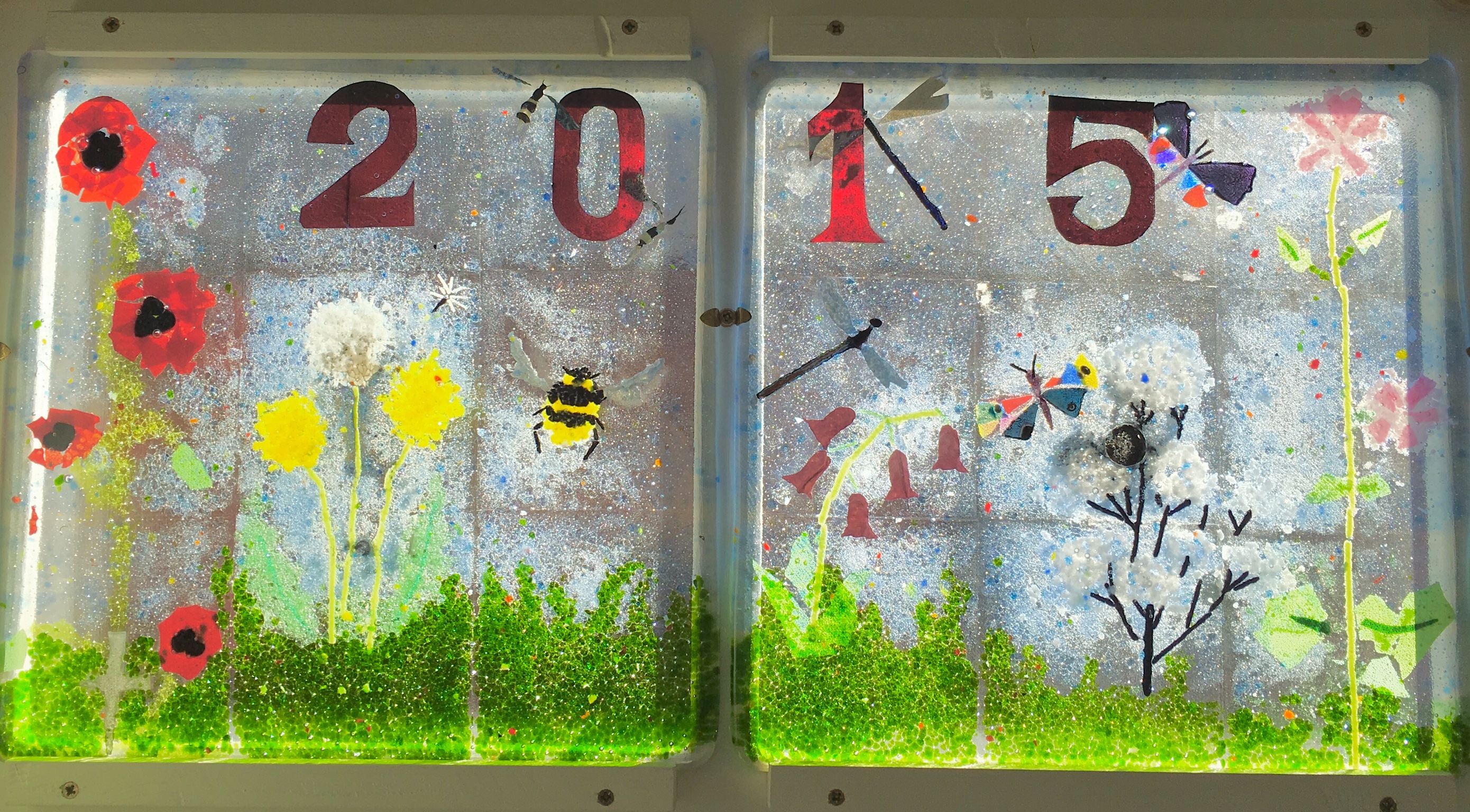 One of ten glass fused panels made by Y6, part of the 2015 leavers legacy window