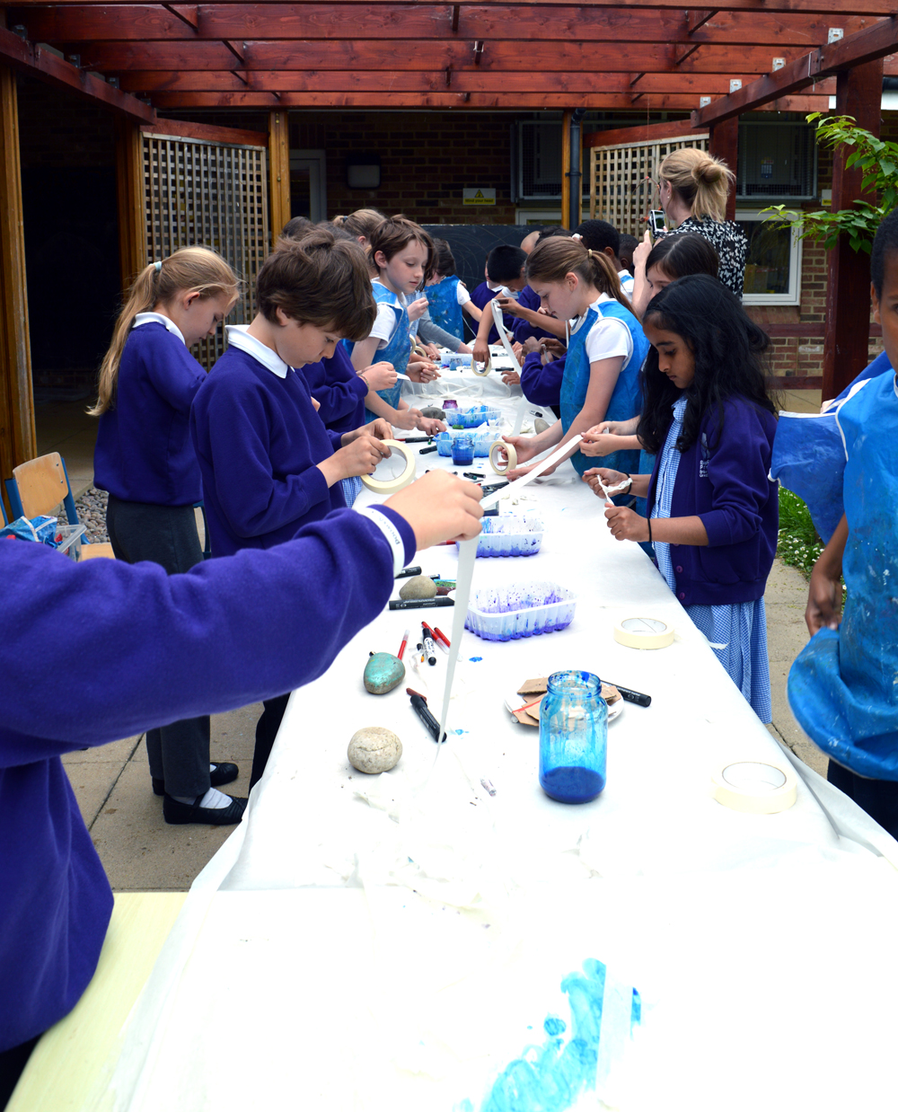 Initially pupils draw long river lines in masking tape 