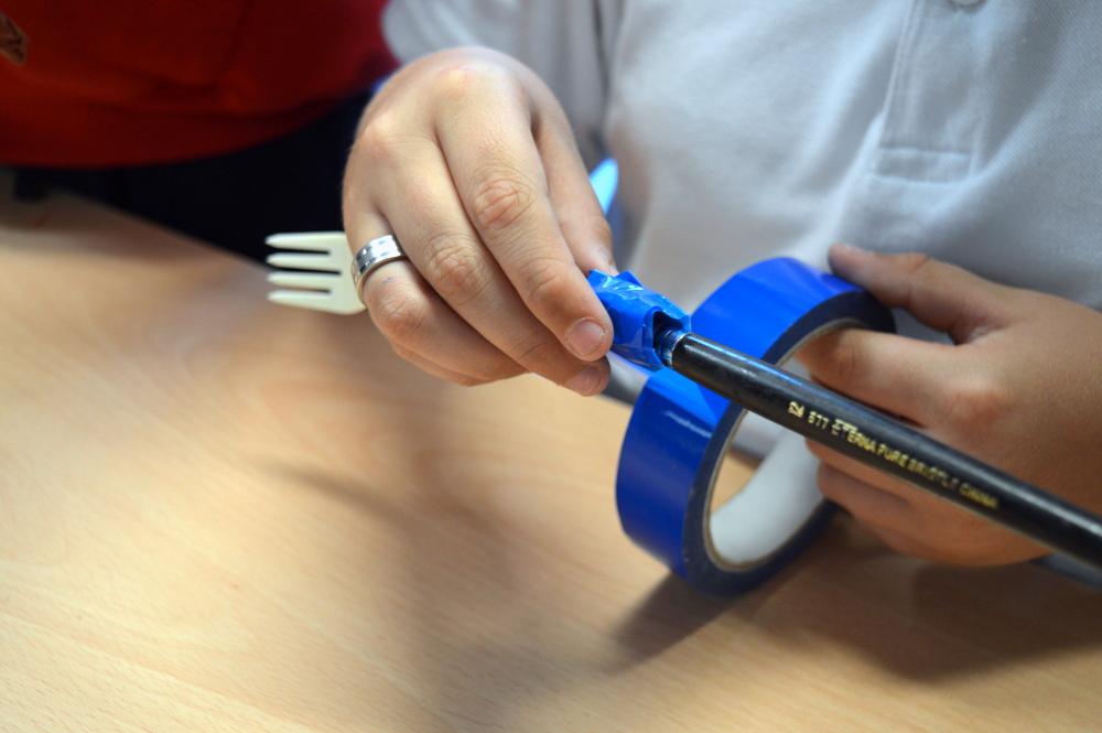 Binding with coloured tape