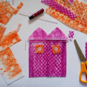 Using collage and textiles to create a house picture