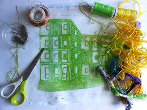 Andrea Butler combines making a collagraph print with fabric and stitch to create a 2D image which could then be used to make a sculptural model house.