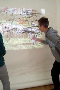 Large scale collaborative drawing activity embeds arm movments in preparation for recreating marks in the dark Sara Dudman