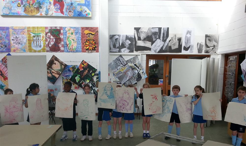 Year 3 Size A1 Mono-printing by inking up entire tables in my Artroom. Indian-themed portrait with birds.