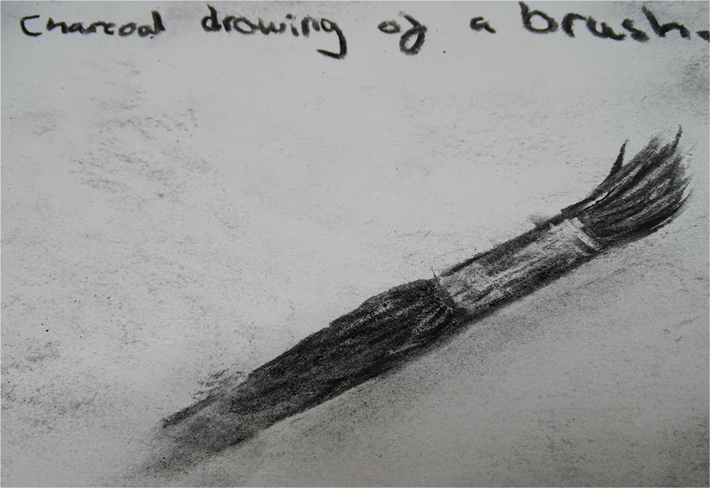 charcoal drawing of a brush