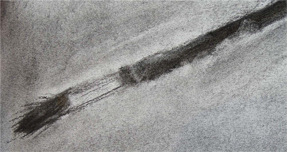 charcoal drawing of a brush