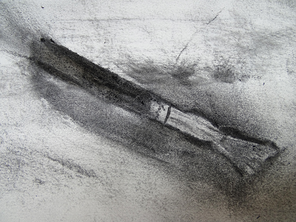 charcoal drawing of a brush